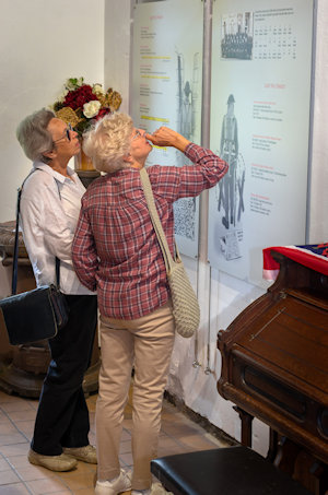 Visitors viewing the exhibition boards.