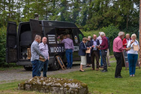 Scene in the Churchyard where the Pop-Up-Pizza van was supplying refreshments.